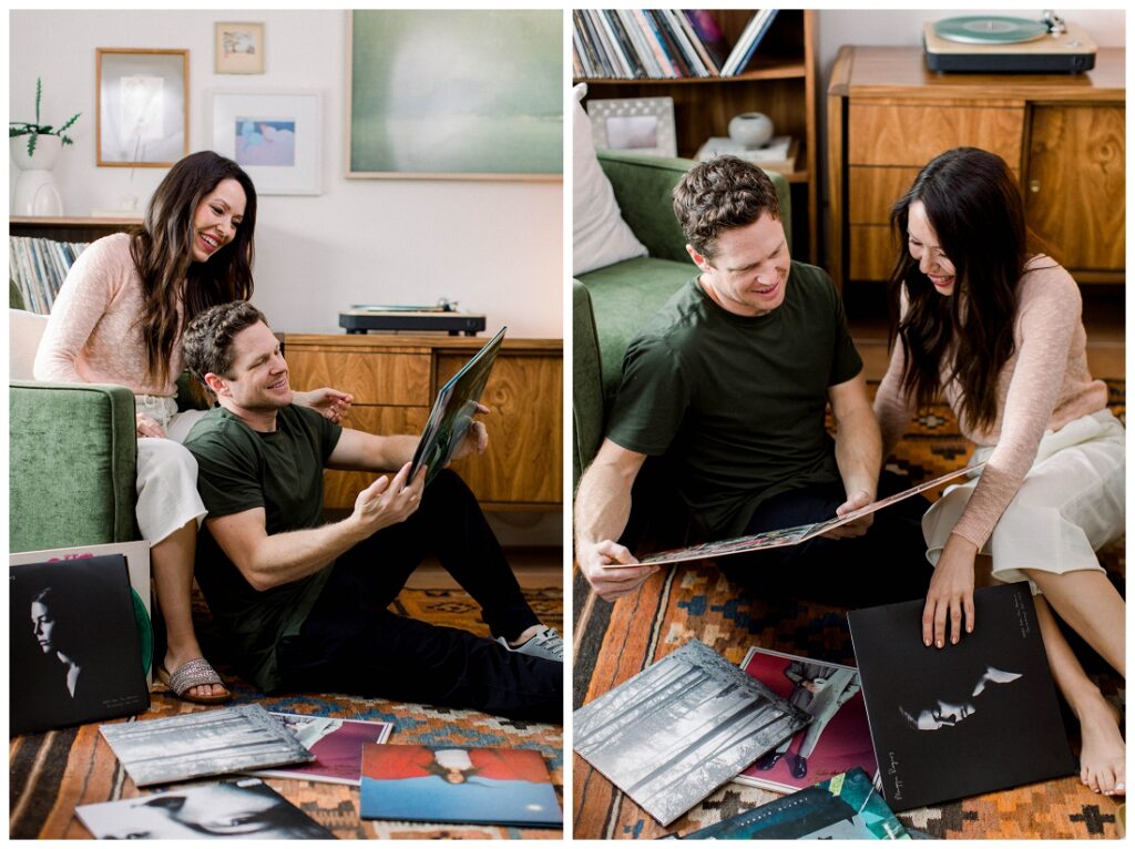 Arizona Brand Photographer Couple looks at vinyl records on living room floor