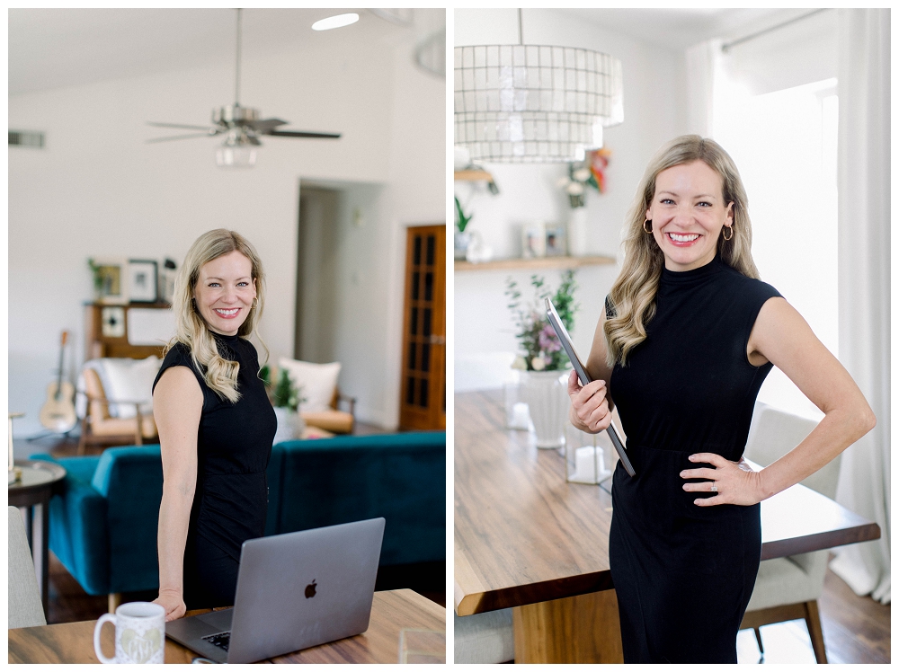 Branding Portrait of a woman standing in a living room holding a laptop. 