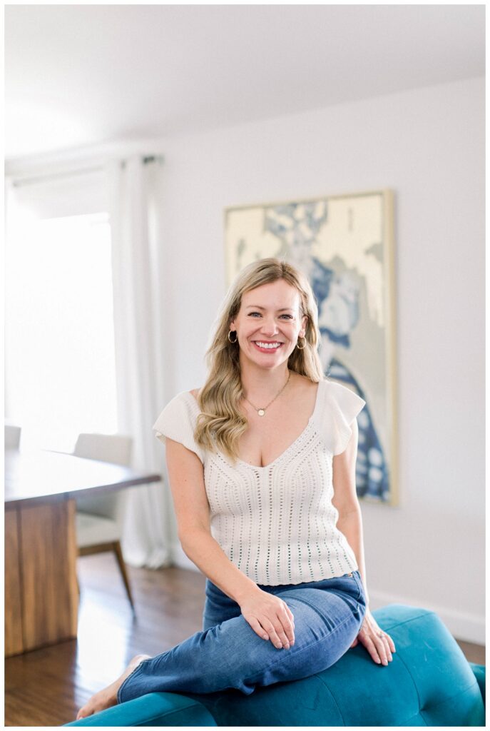 Branding portrant of a woman sitting on a chair. 