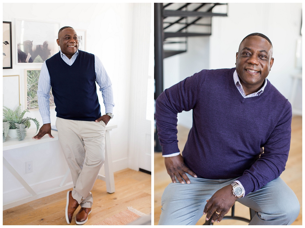 Two images of a man wearing a purple sweater . In one image he stands next to a table and in another he smiles at the camera and sits on a stool. 