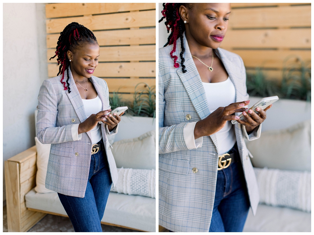 Arizona Brand Photograpy Two Images side by side, in both a woman in a grey blazer scrolls on a cell phone. She is standing next to an outdoor sofa and wearing jeans. 
