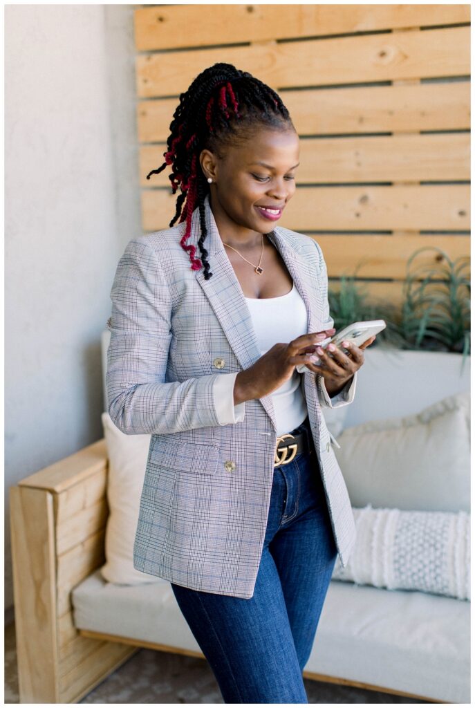 Branding Portrait a woman scrolls on a phone. 